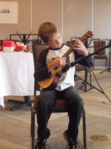 Cam Smith - the youngest participant at the 2013 Ceilidh performing at the Open Mike